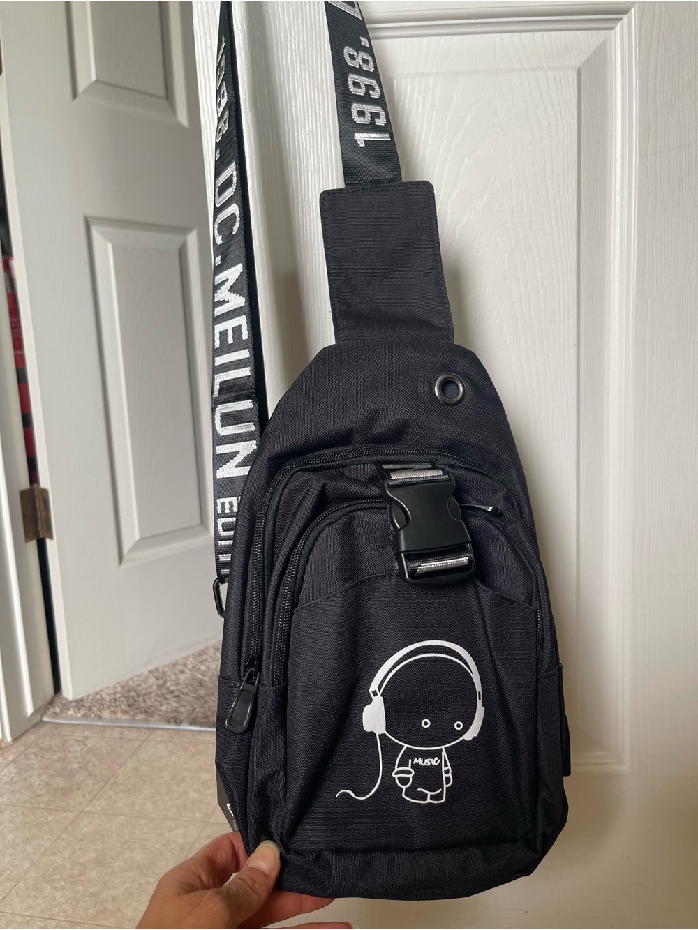 Black Crossbody Sling Bag with Headphone Graphic